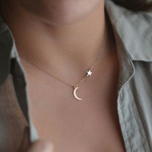 Gold star and moon necklace